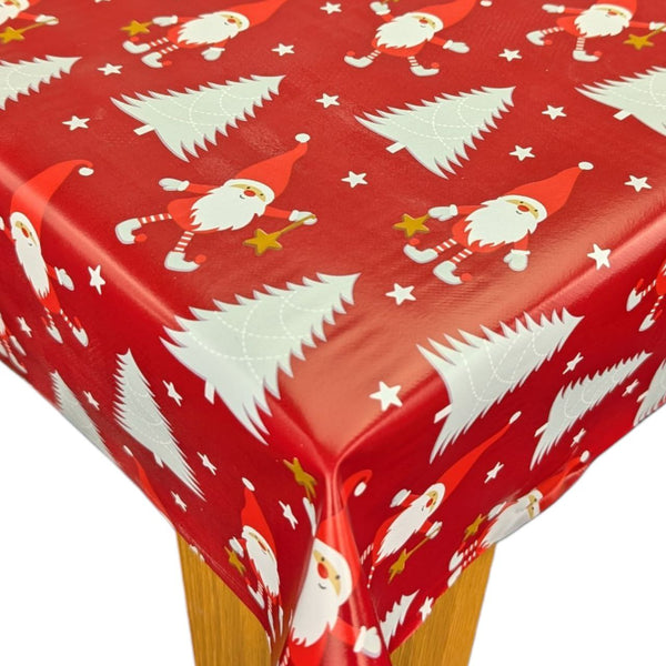 Santa Christmas Trees and Stars on Red Vinyl Oilcloth Tablecloth